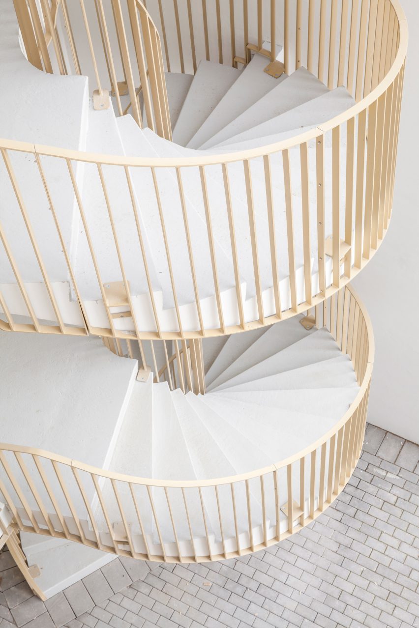 Spiral staircase of Zellige housing in Nantes, France, by Tectône and Tact Architectes