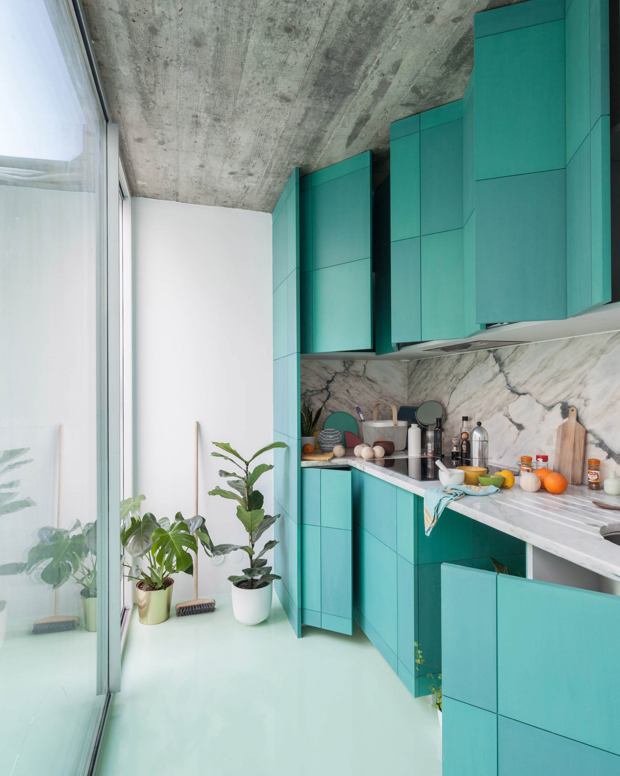 Three colours of minty green kitchen
