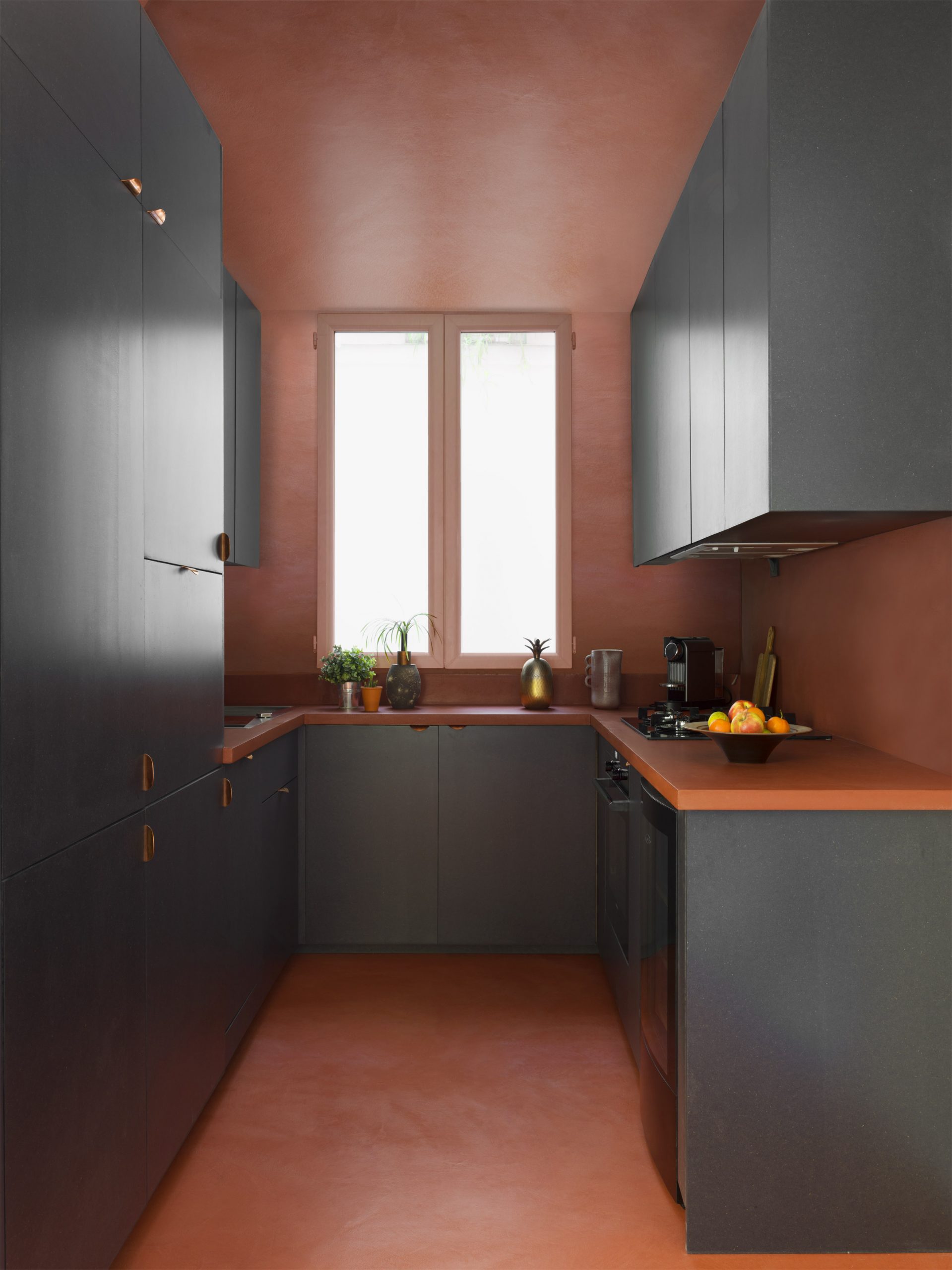 Rusty orange kitchen with grey cupboards