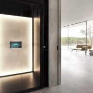 Aritco Homelift by Aritco includes backlit wall that displays artwork