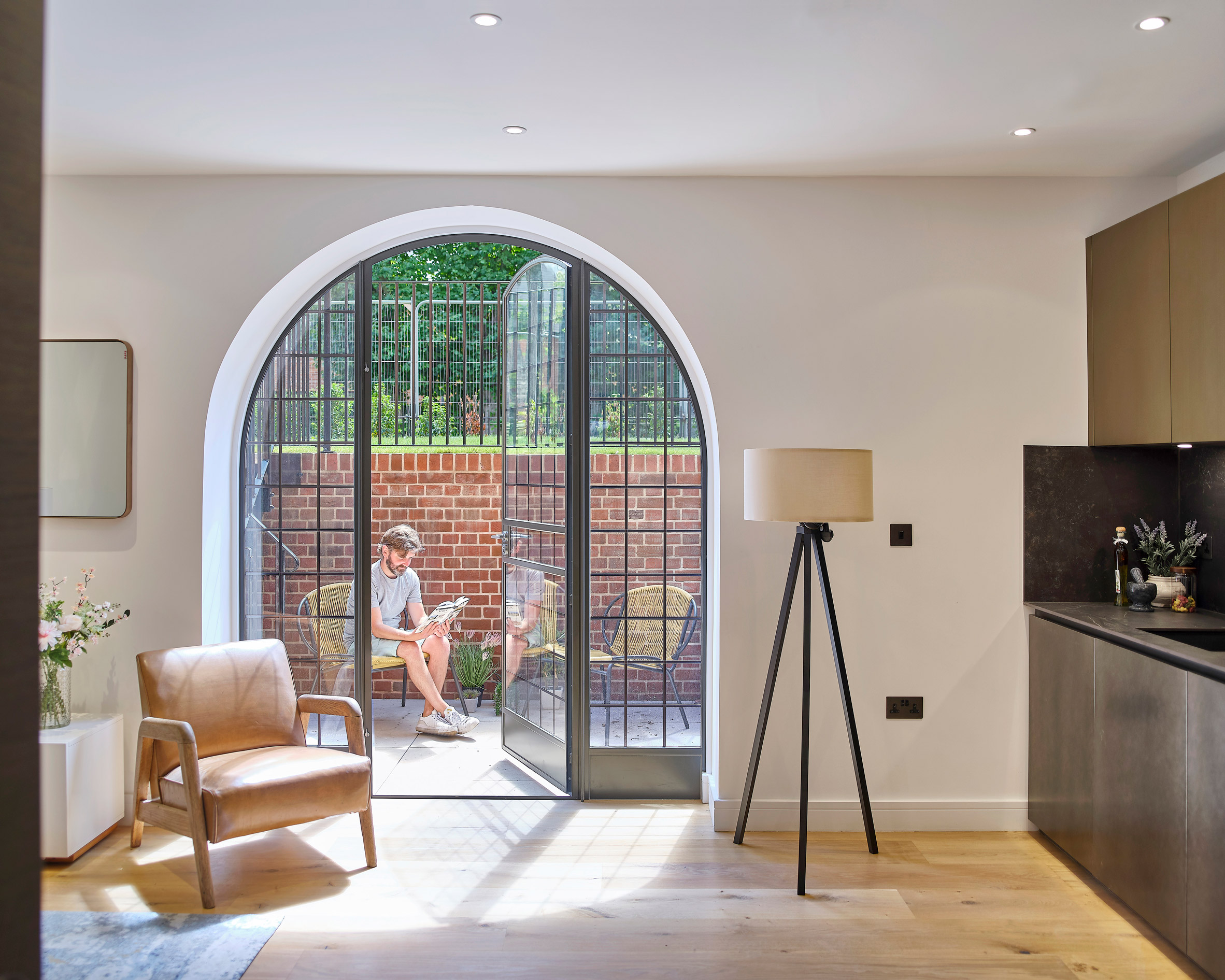 Basement apartment of Belsize Fire Station converted into apartments by Tate Harmer, London
