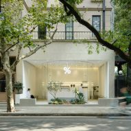 BLUE Architecture Studio adds U-shaped glass box to Shanghai coffee shop