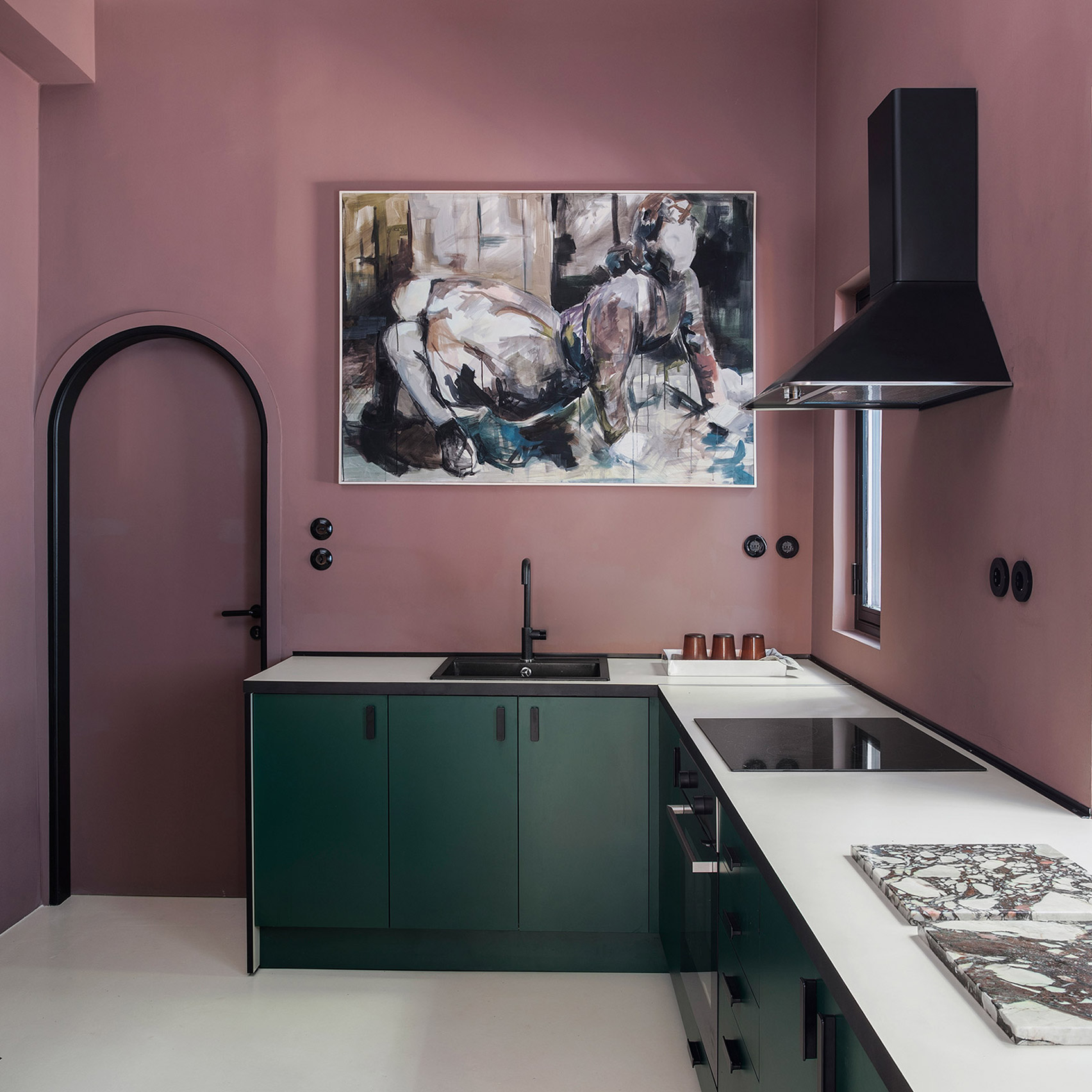 Plum-purple kitchen with green cabinetry