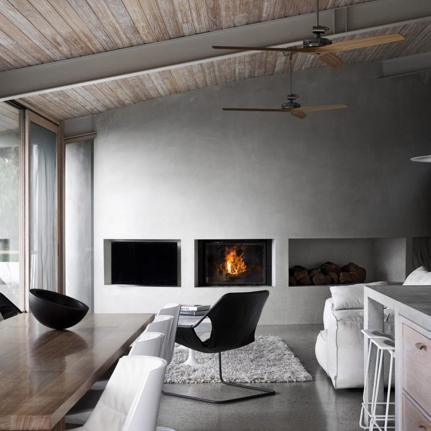 Concrete living room with fireplace