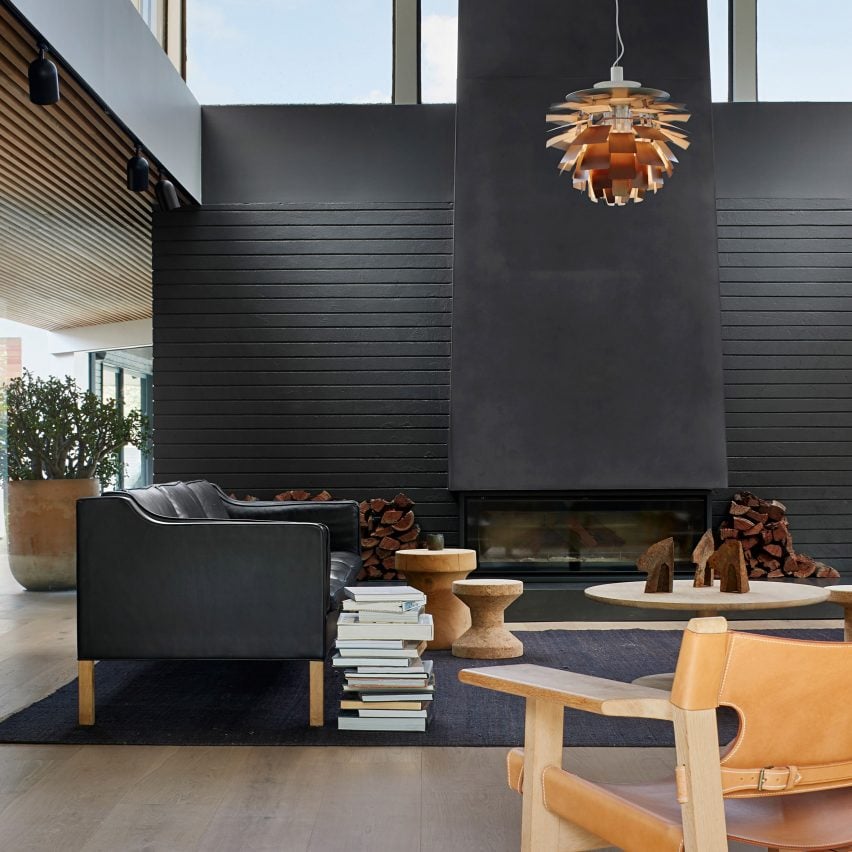 Living room with black fireplace