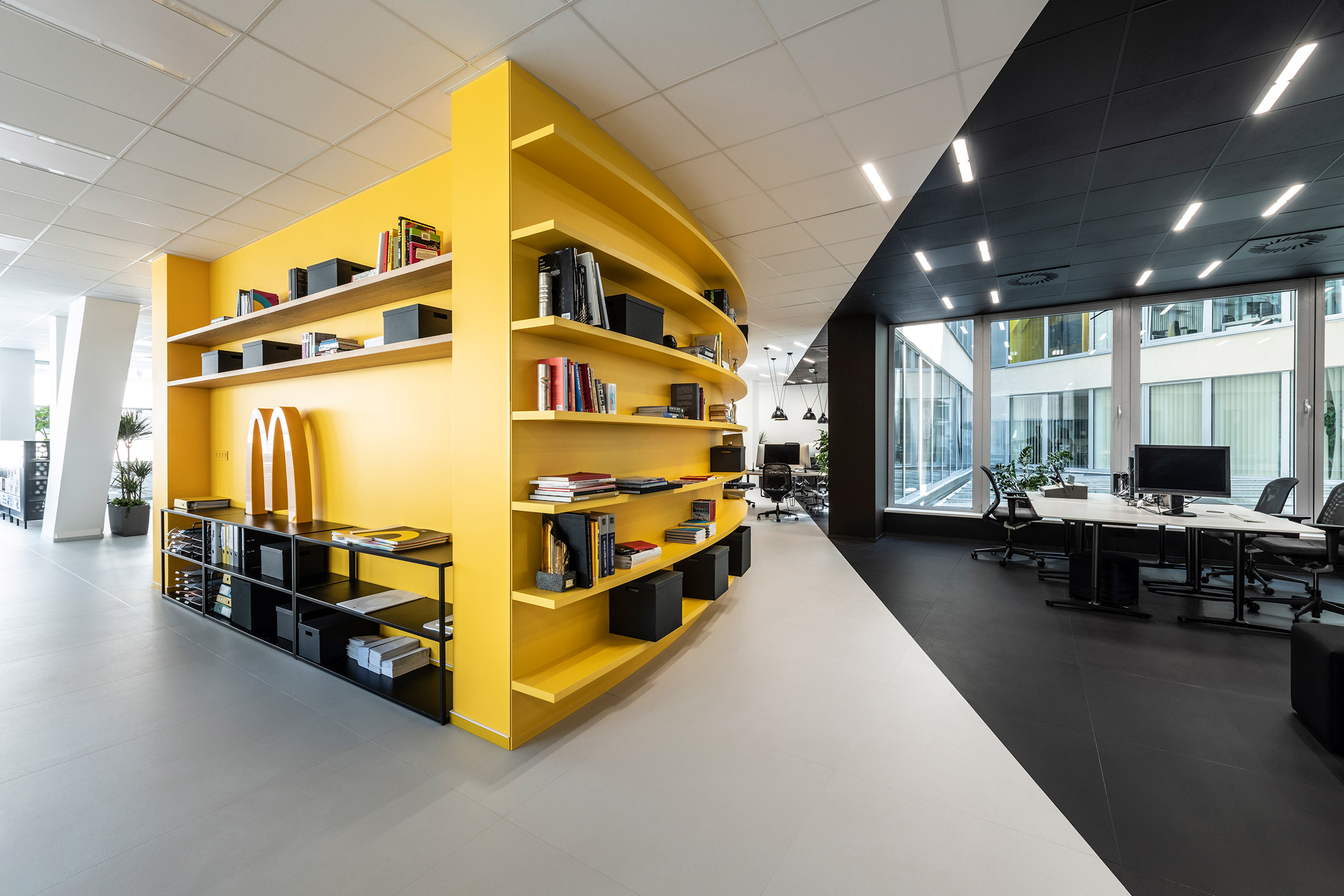 A yellow meeting room in the office for creative agency DDB Prague by B2 Architecture, Czech Republic