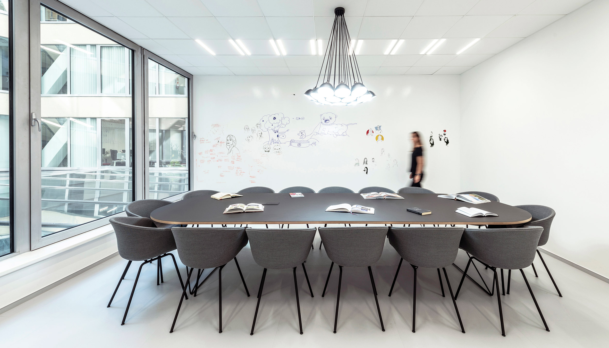 Meeting room with whiteboard in the office for creative agency DDB Prague by B2 Architecture, Czech Republic