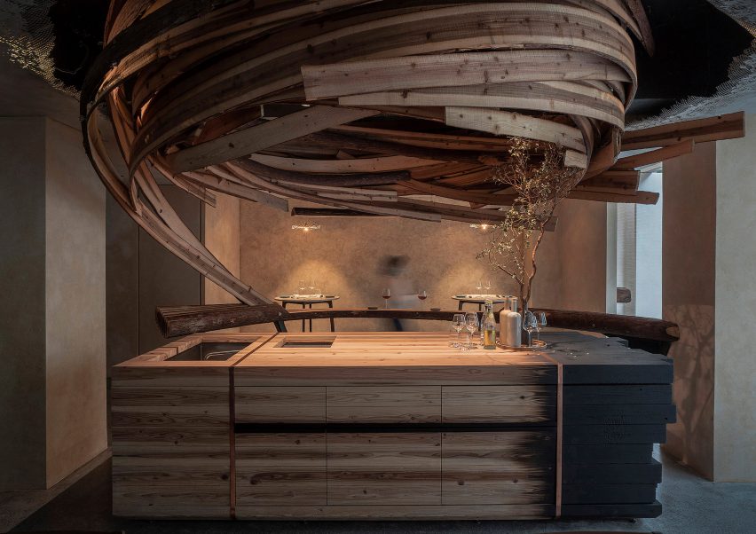 Interior of Embers restaurant in Taipei has nest-like sculpture made from cedar wood