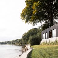 Norm Architects creates black-timber retreat near border of Denmark and Germany