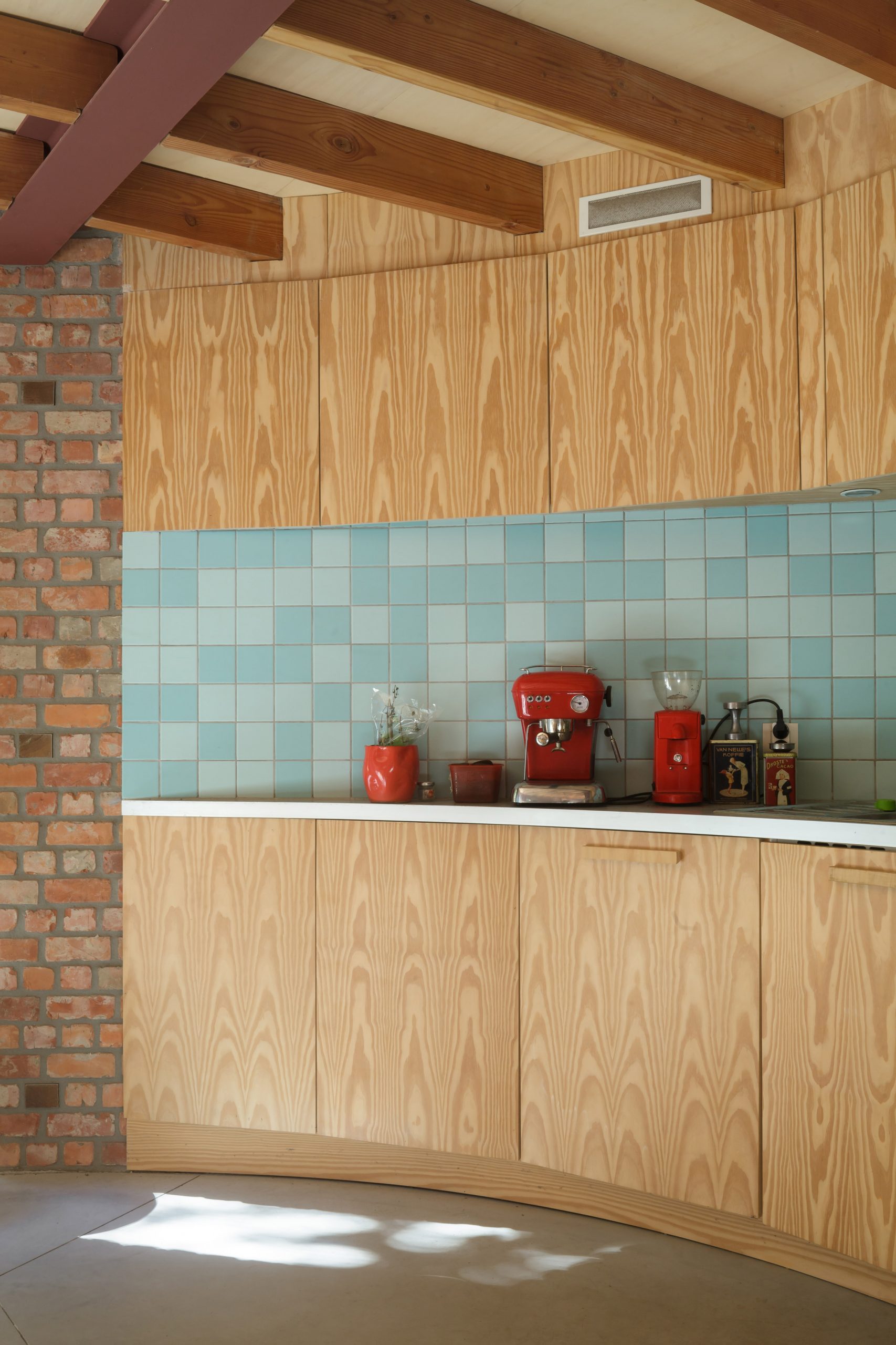 Kitchen of GjG House built of reclaimed bricks by BLAF Architecten in Ghent, Belgium