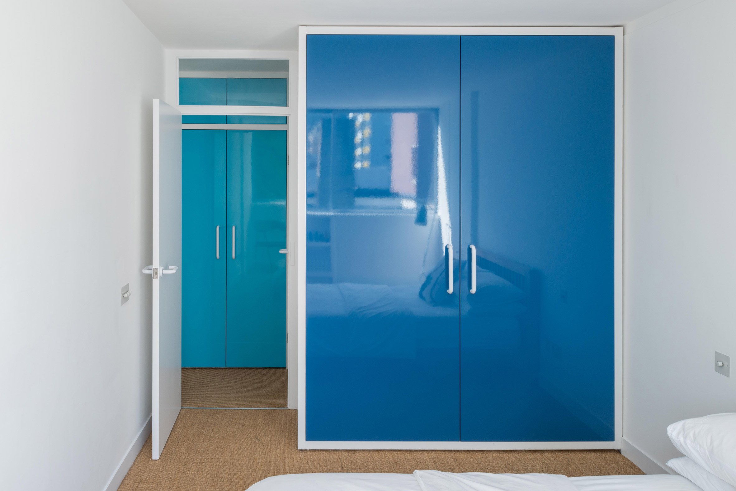 Blue closet in Golden Lane flat by Archmongers