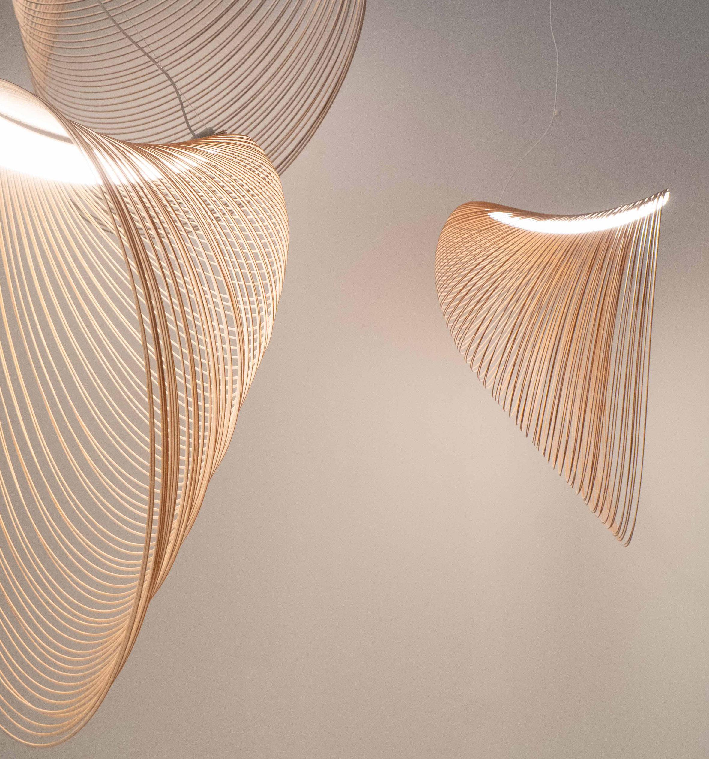 Three sizes of Illan Pendant Light designed by Zsuzsanna Horvath from birch plywood