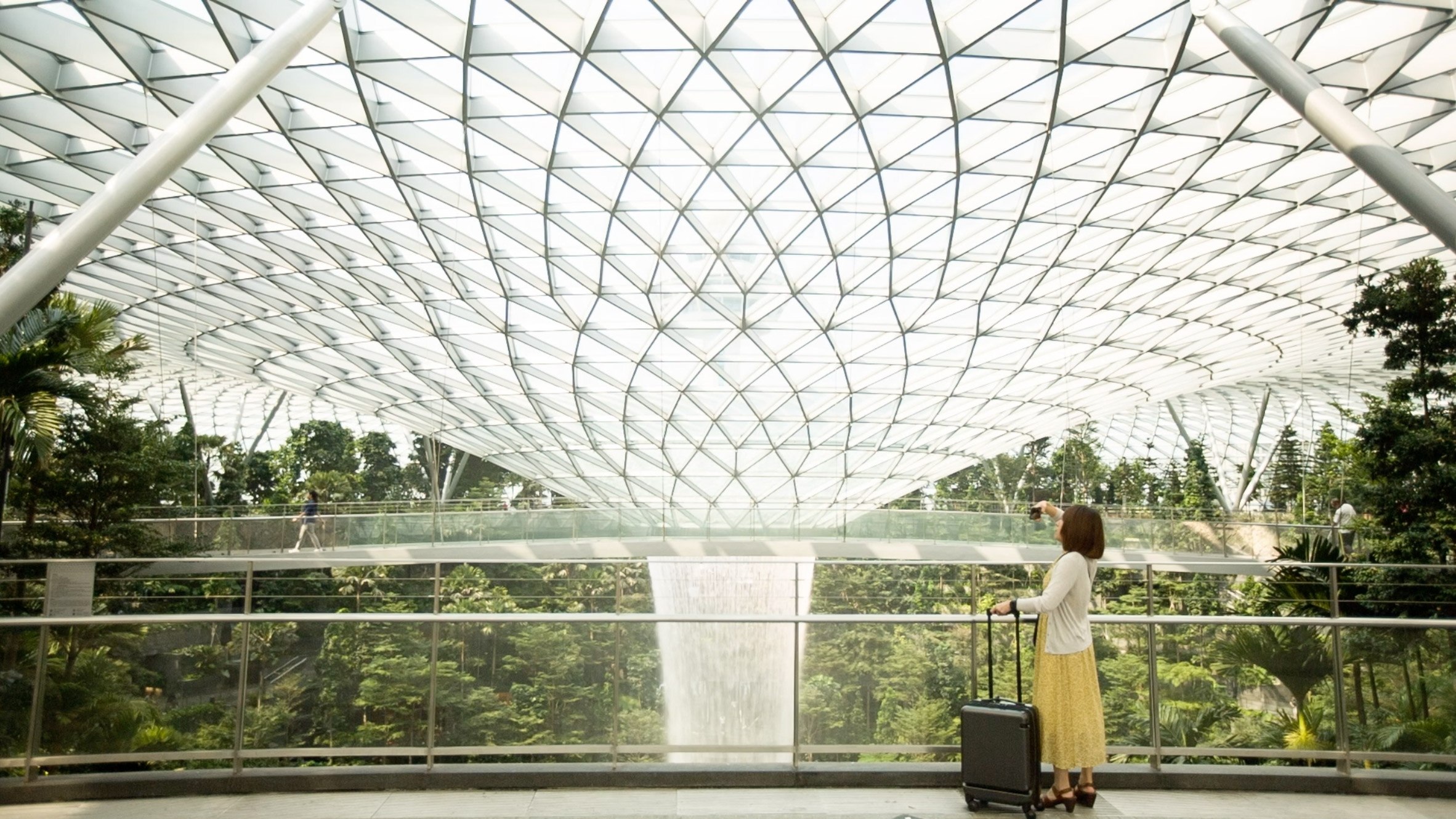 Sweeping glass facade of Apple Jewel Changi Airport unveiled in