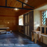 Huo-shui-yuan exhibition centre in Loudi, China has timber interiors