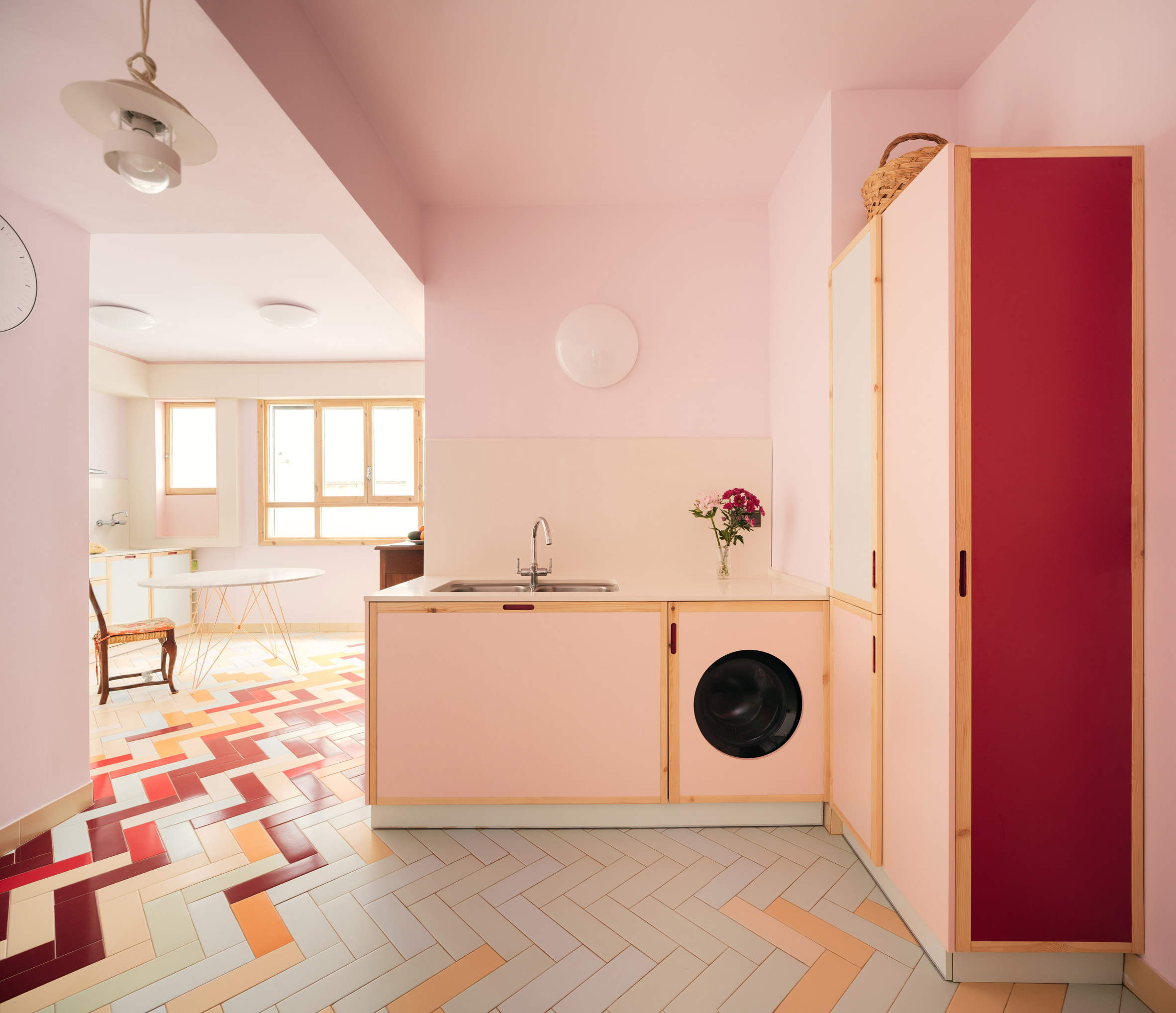 Pink kitchen with tiled floor