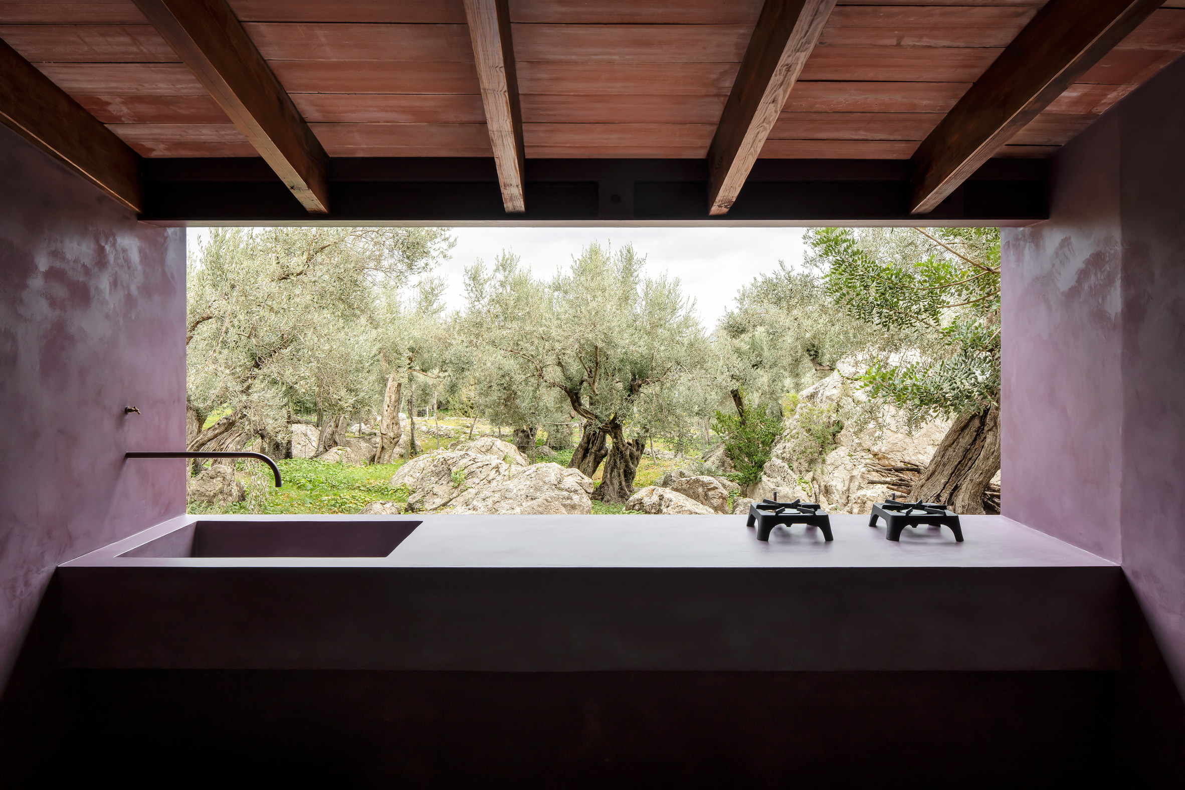 Sink and stover overlooking an olive grove