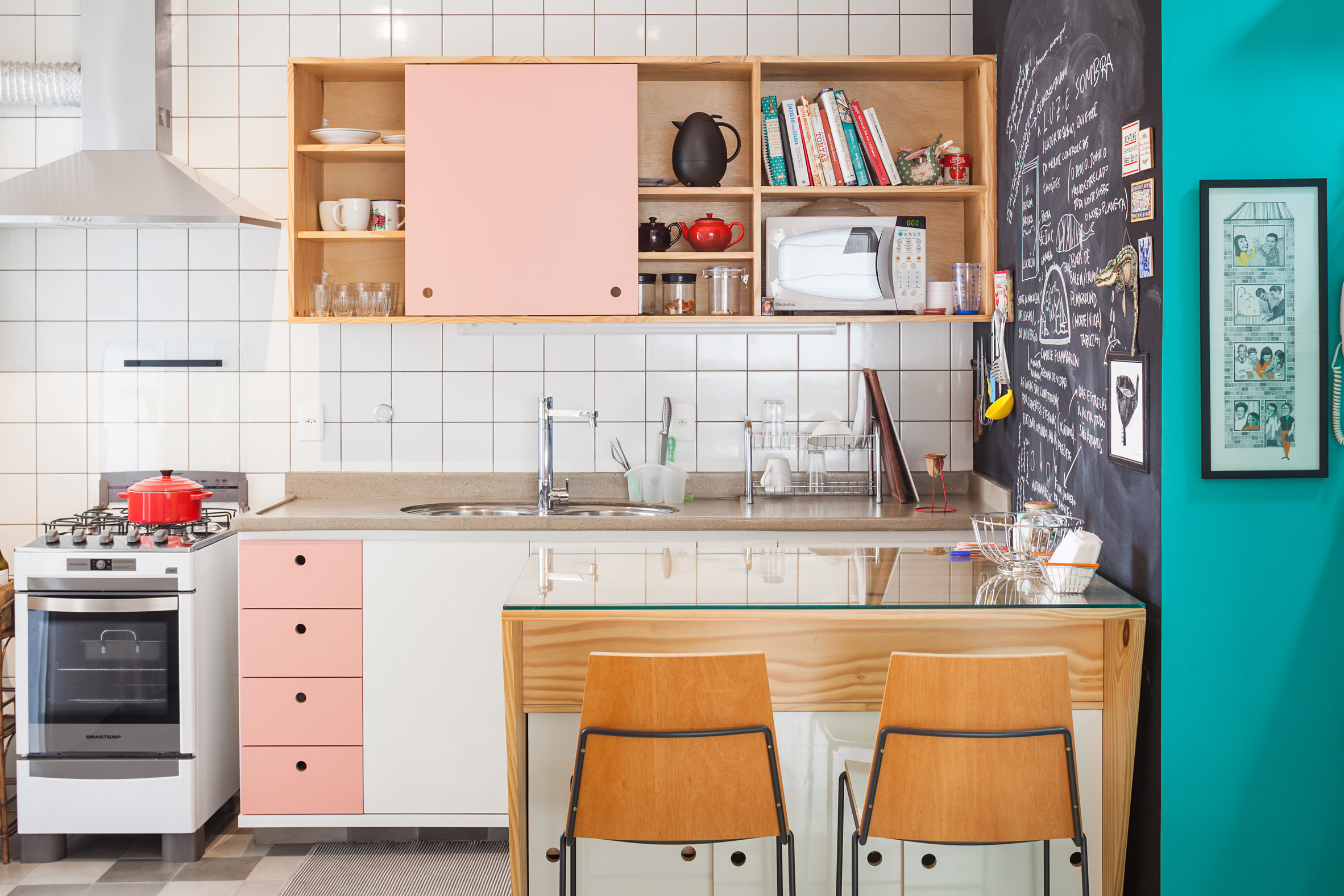 White tile and pink cabinet kitchen