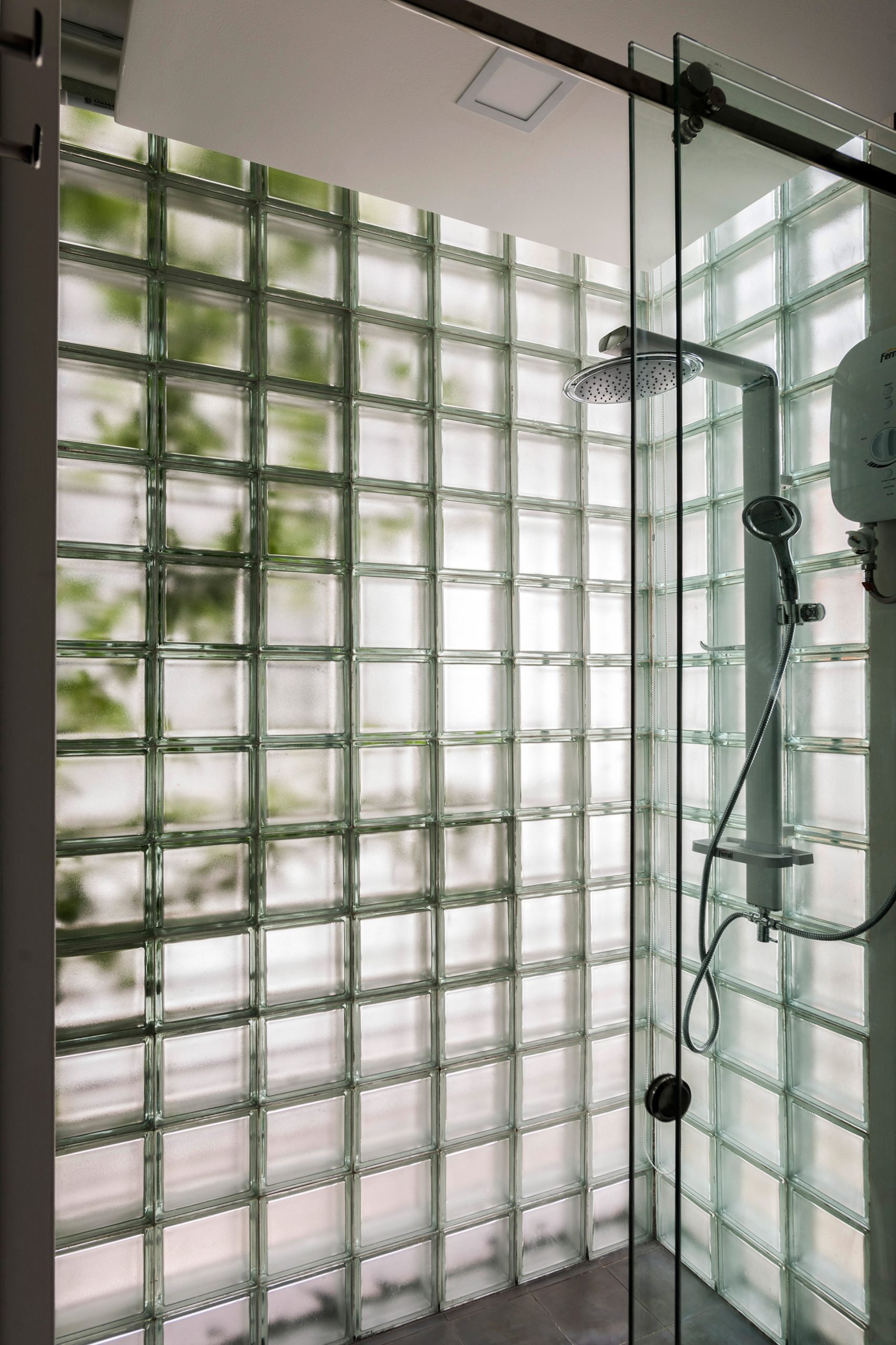 Shower room of Glass-Block Micro House, Vietnam, by ROOM+ Design & Build