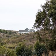 A distant photo outside of SP House by (E)StudioRO in Chile