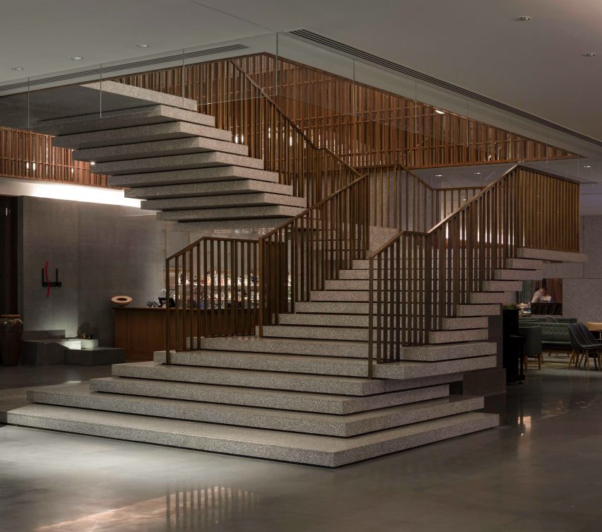 Terrazzo and bronze staircase features in The Sukhothai Shanghai hotel