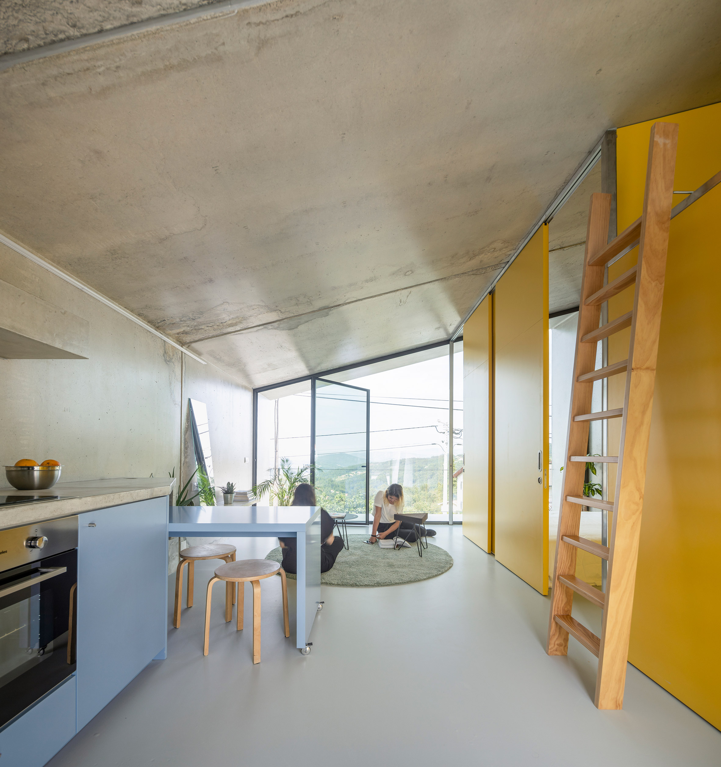 Living area of VDC modular prefabricated concrete housing by Summary in Portugal