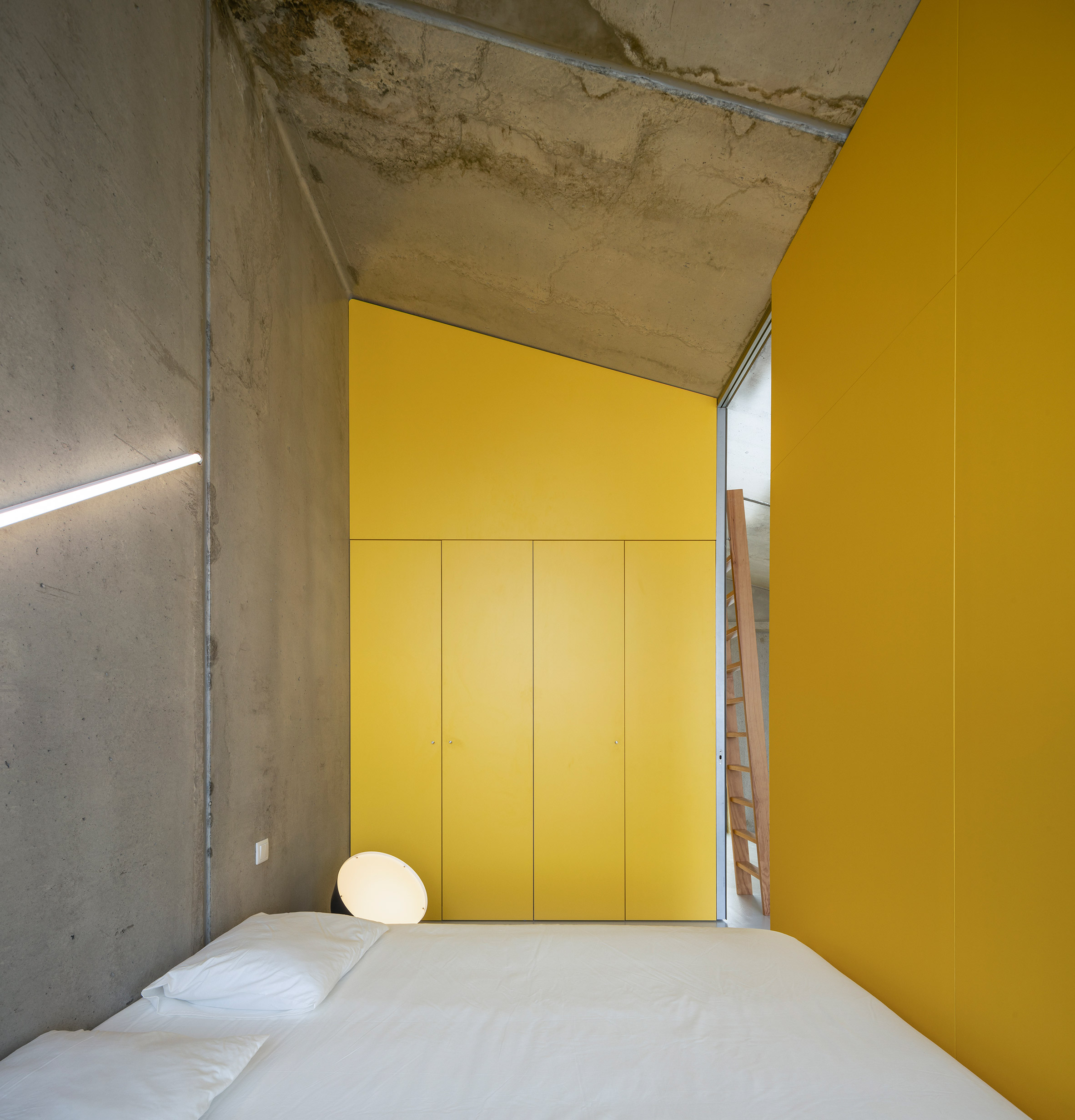 Bedroom of VDC modular prefabricated concrete housing by Summary in Portugal