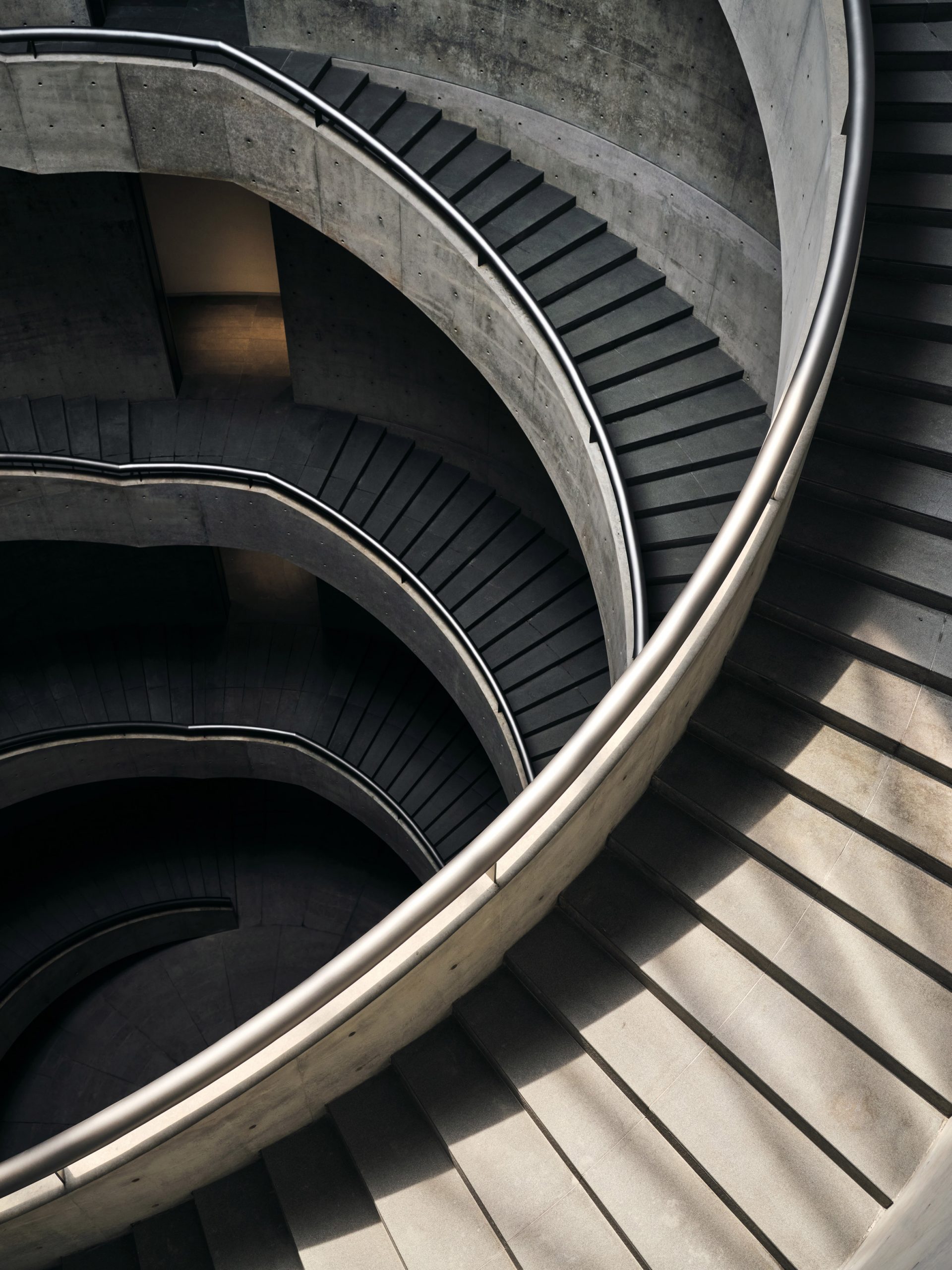 The helical staircases inside He Art Museum's central courtyard