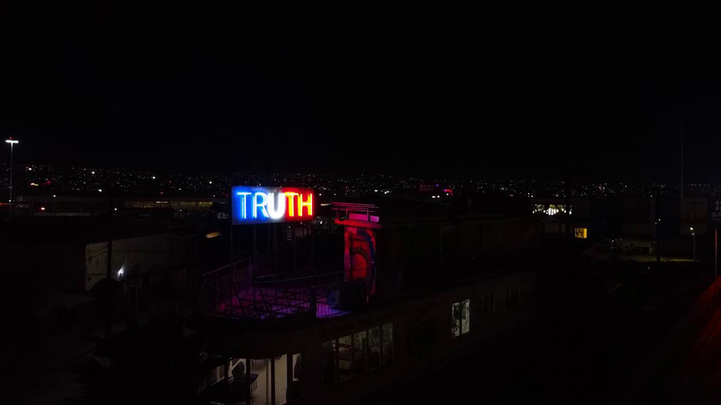 TRUTH/LIE neon lights by Stefan Brüggemann colours of the American flag