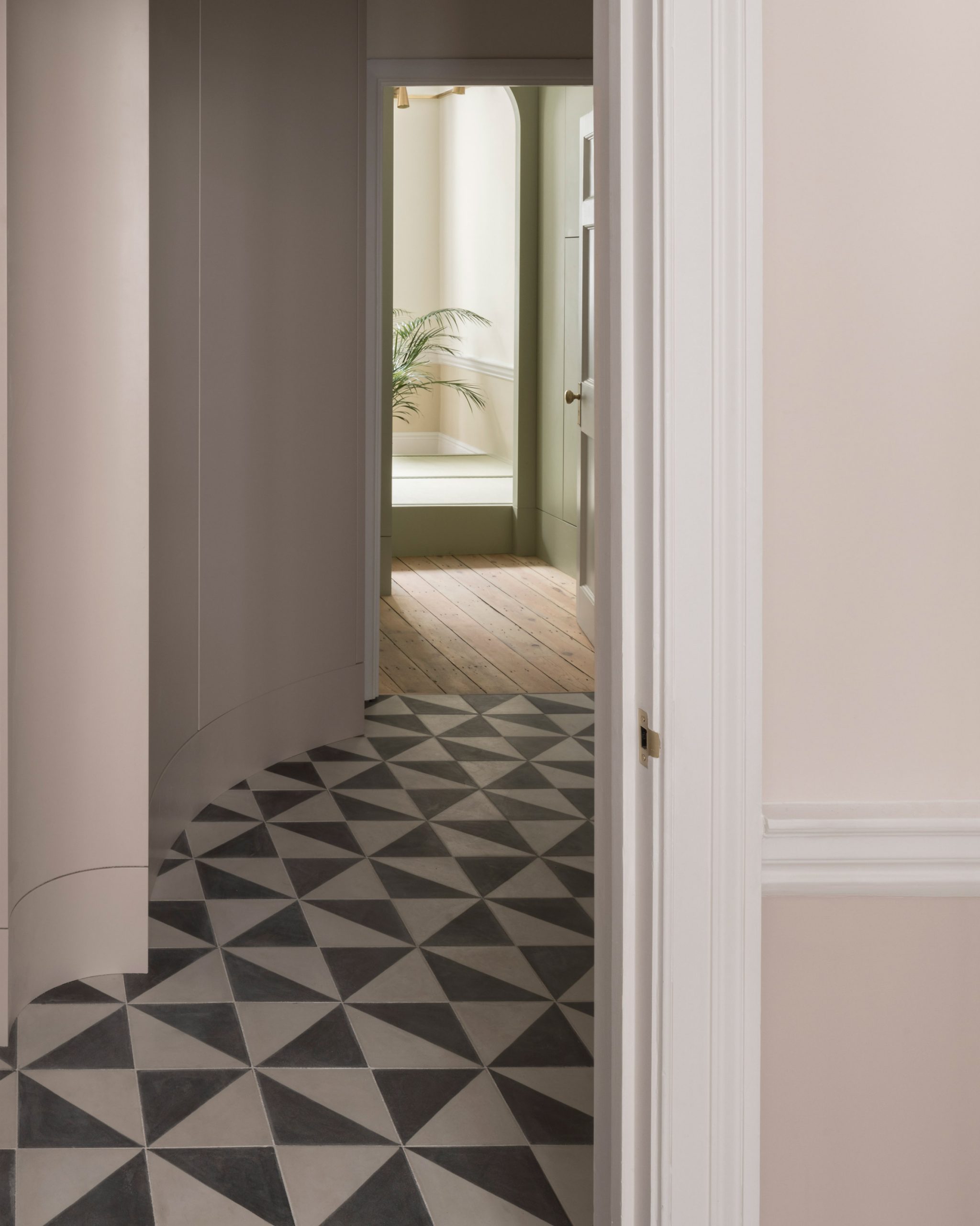 Tiled corridor of Upper Wimpole Street apartment by Jonathan Tuckey Design