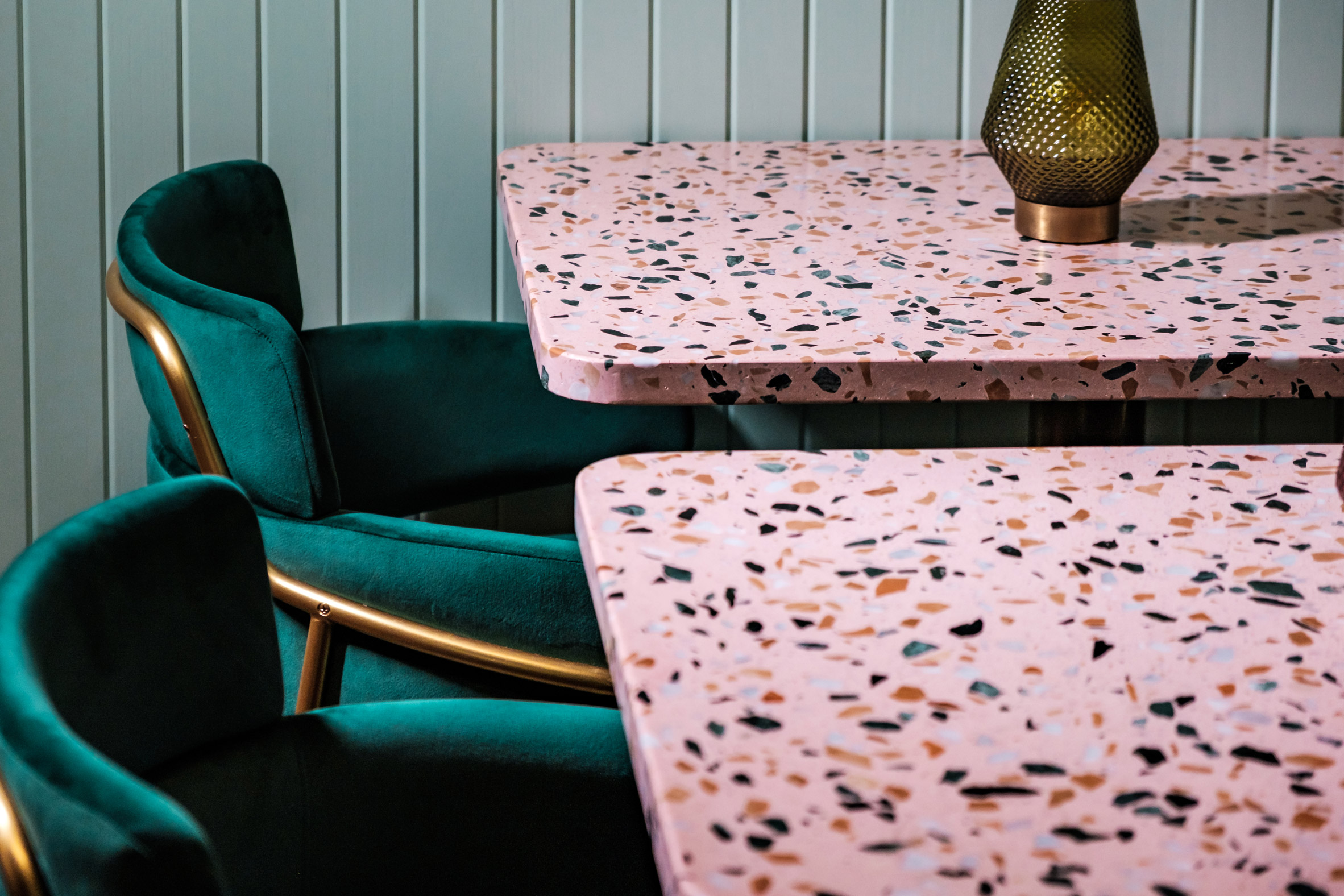 Pink terrazzo tables and velvet chairs feature in Malta's Barbajean restaurant