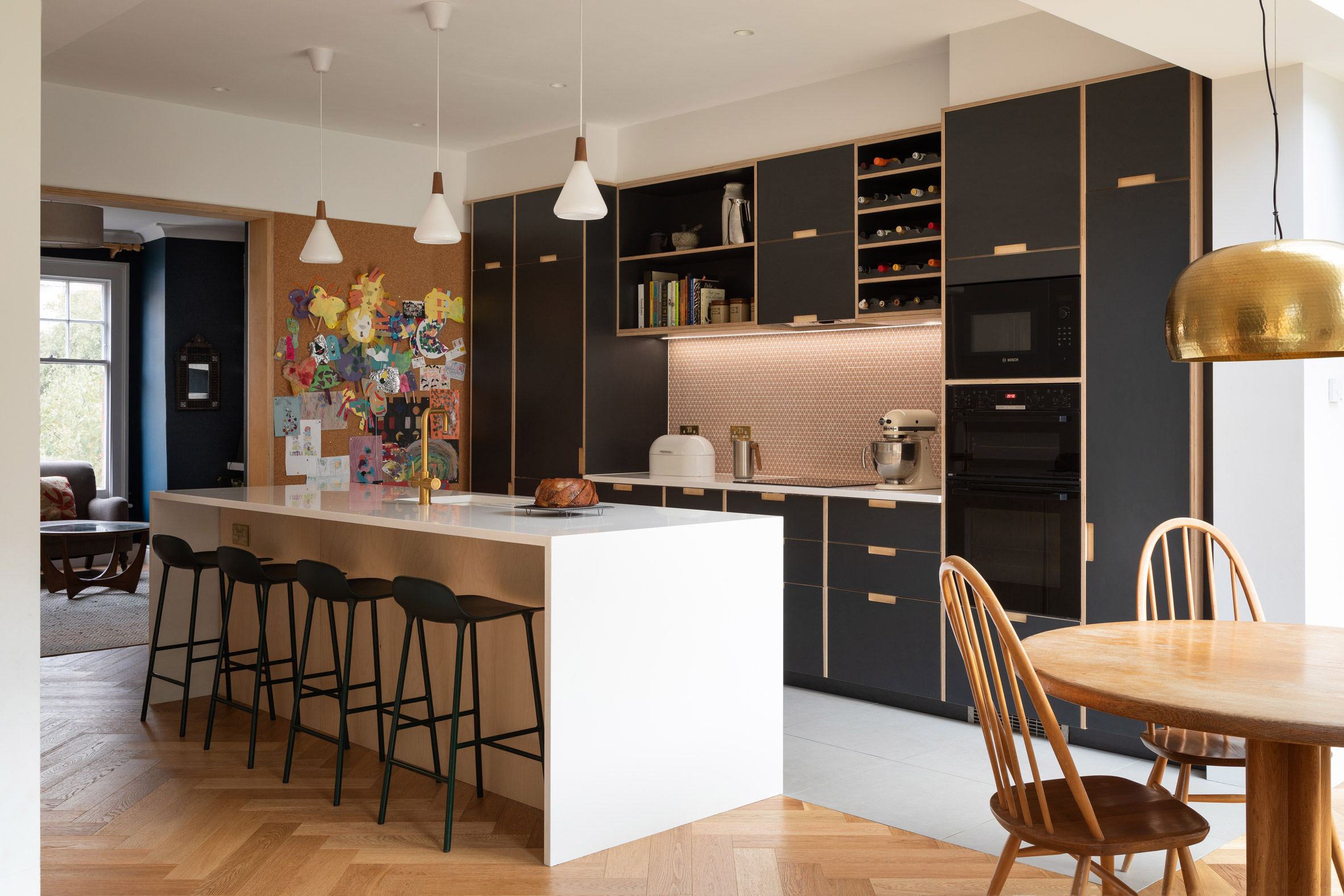 The Charred House kitchen by Rider Stirland Architects in London