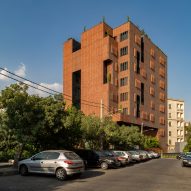 Hooba Design Group clads Tehran office building in brick panels that adjust to the sunlight