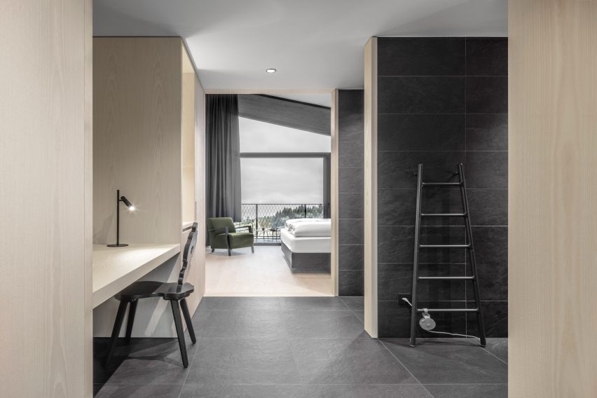 A hotel room inside Hotel Milla Montis by Peter Pichler Architecture