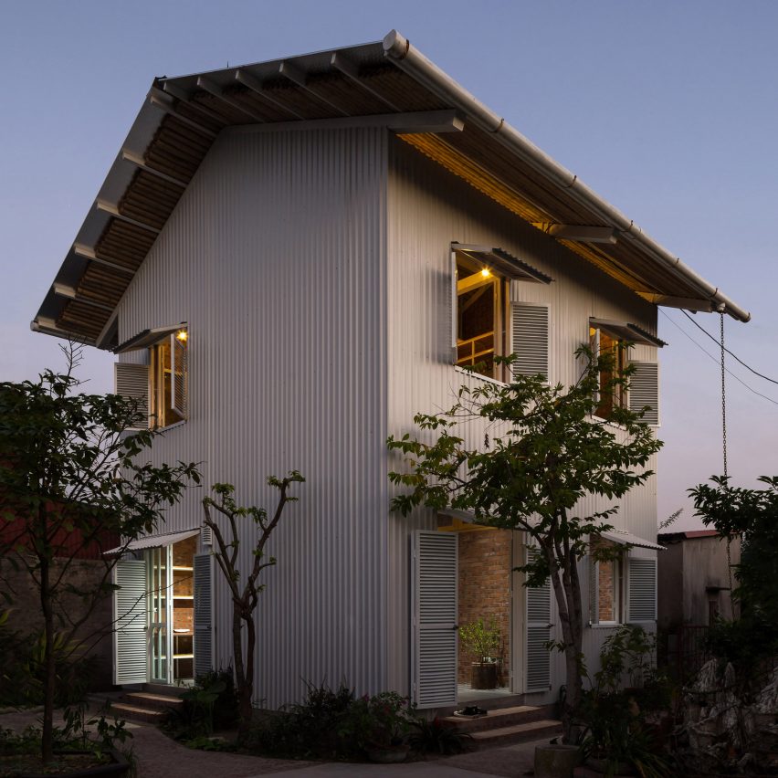 H&P Architects designs white corrugated-metal house in Hai Duong