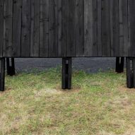 The charred-wood exterior of the Inbetween Pavilion by Pontoatelier
