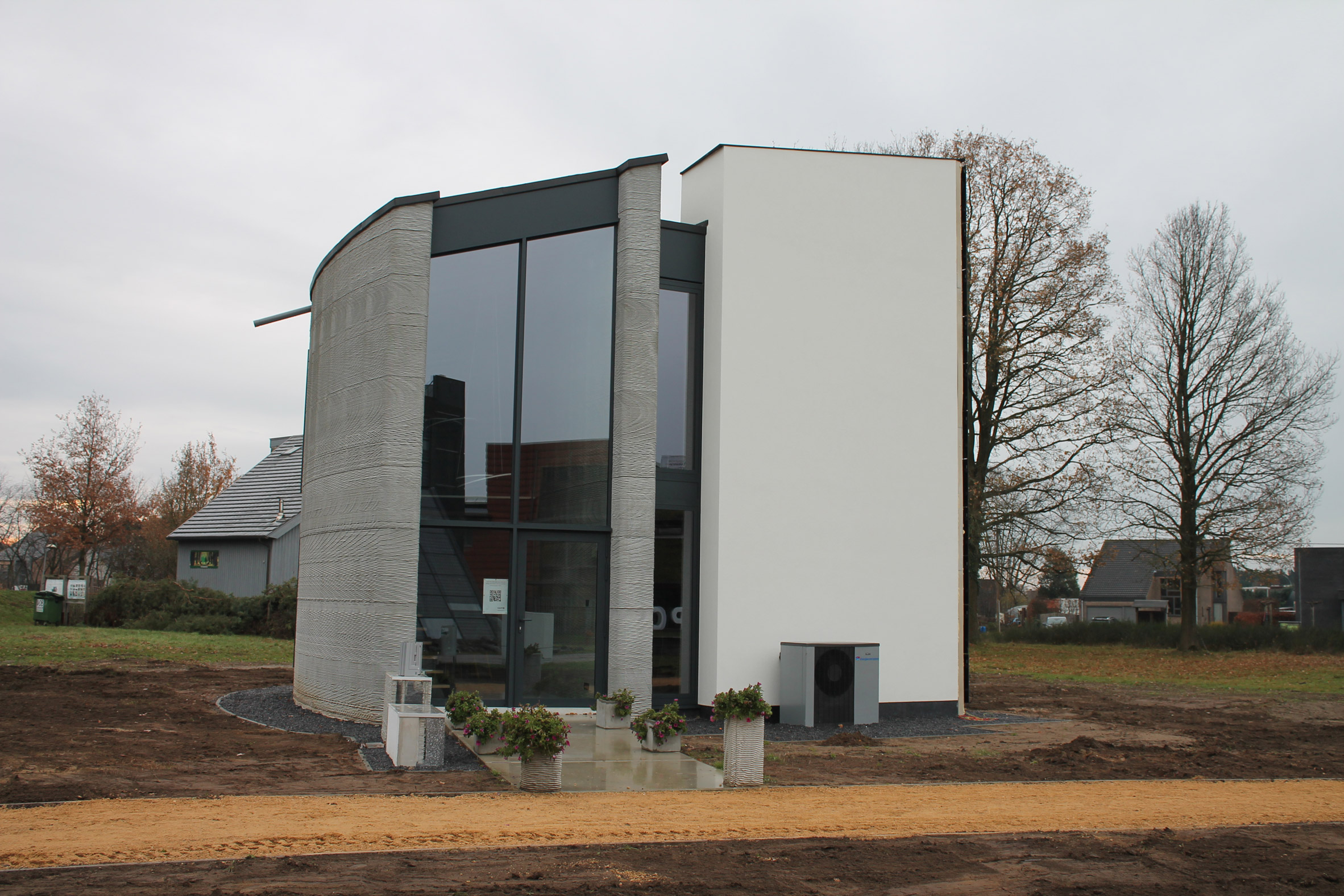Exterior of 3D-printed house Kamp C, Westerlo, Belgium