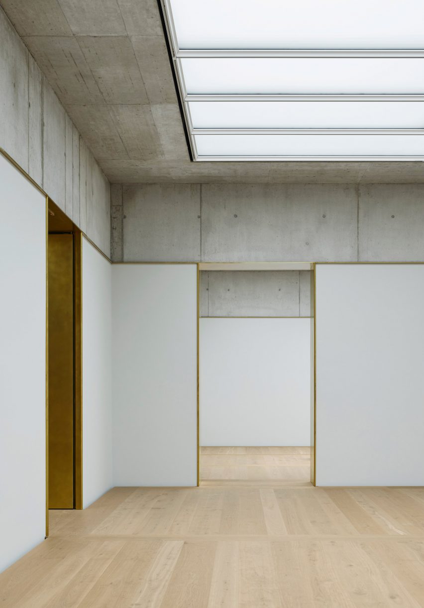 A white-walled gallery inside of the Kunsthaus Zurich museum extension by David Chipperfield