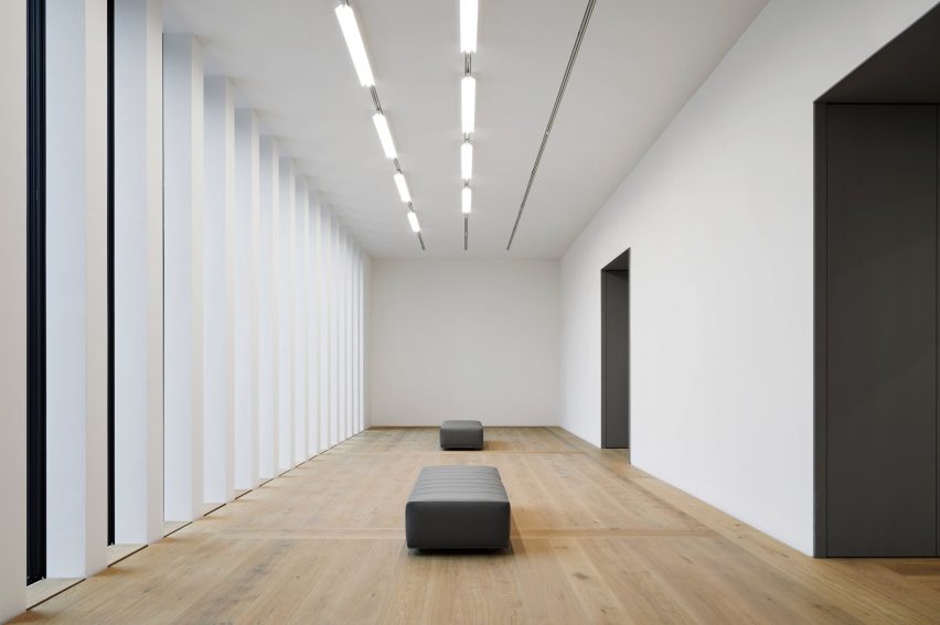 A white-walled gallery inside of Kunsthaus Zurich museum extension by David Chipperfield