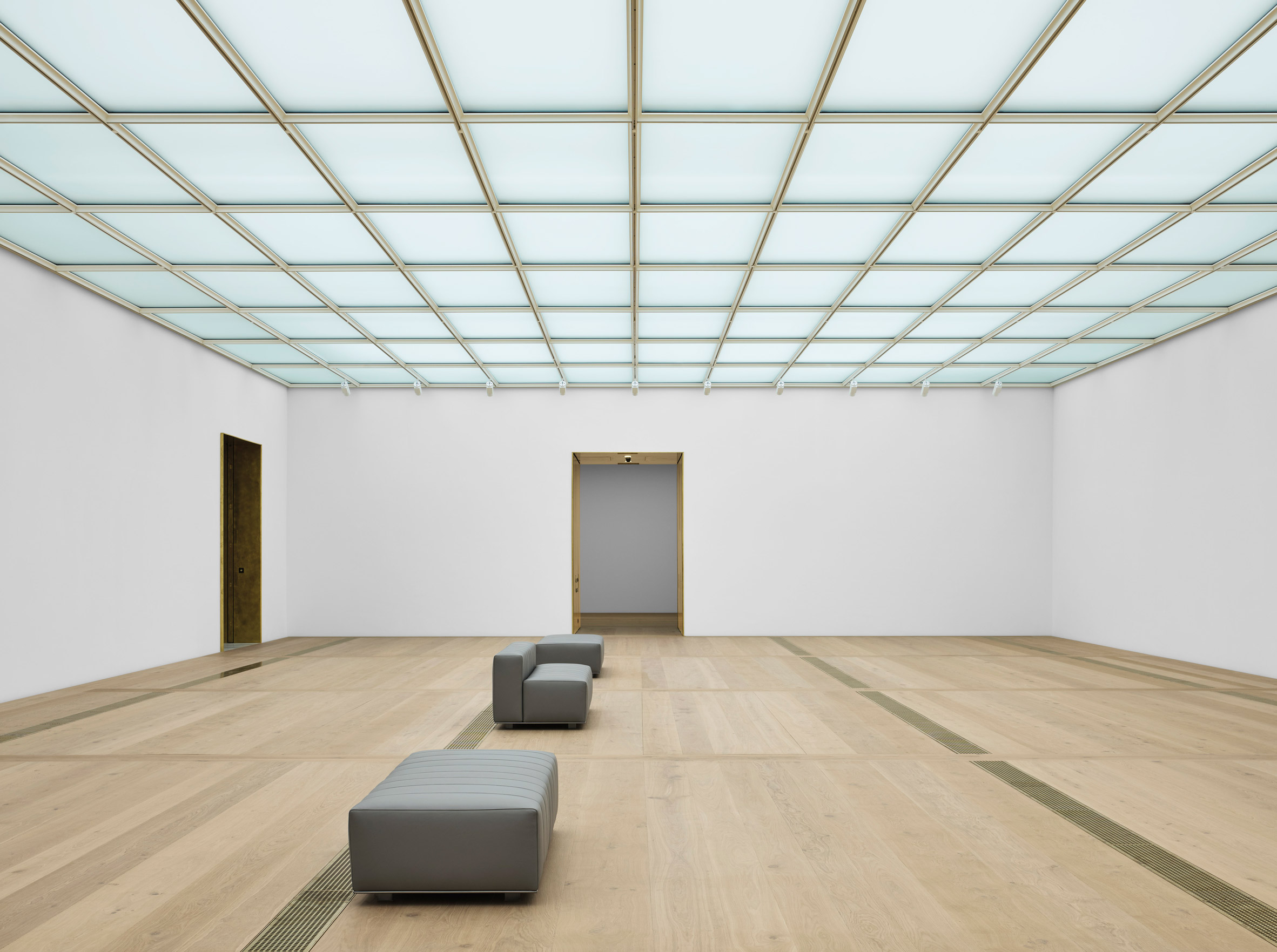 A white-walled gallery inside of the Kunsthaus Zurich museum extension by David Chipperfield