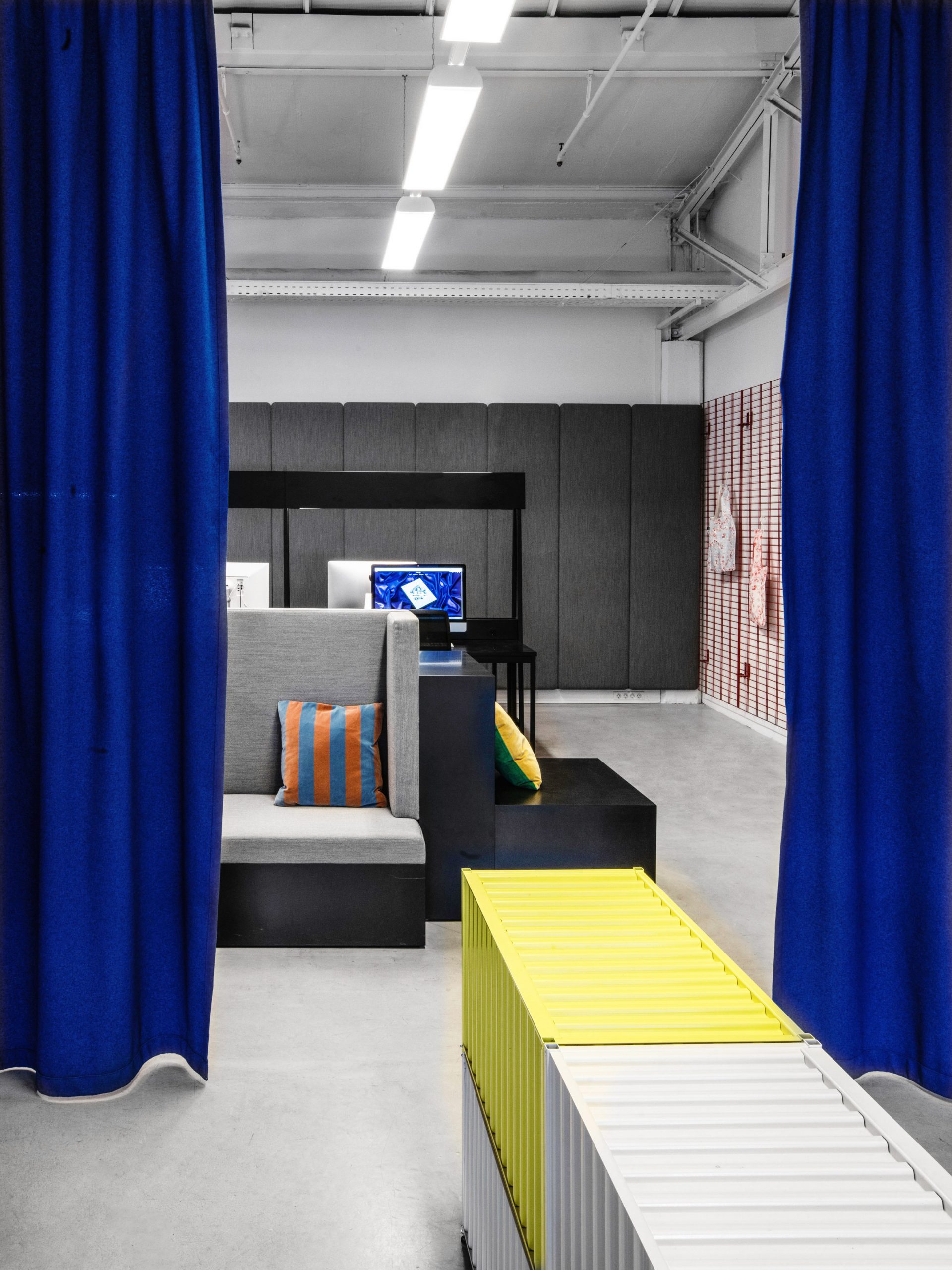 Blue curtains in LOQI Activity Office by Studio Aisslinger