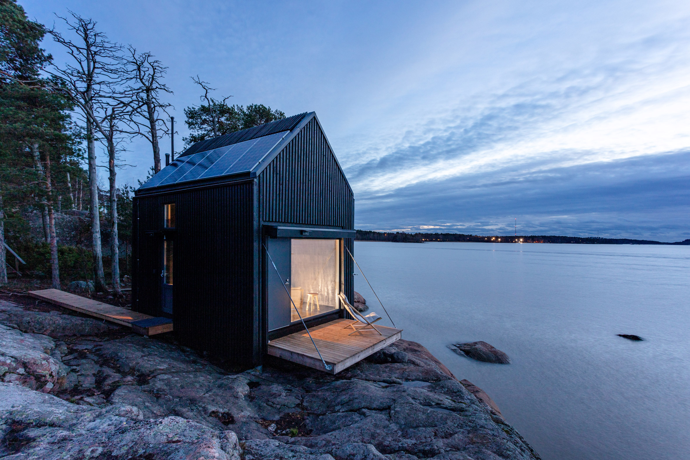 Nighttime view of Majamaja, the off-grid cabin by Pekka Littow