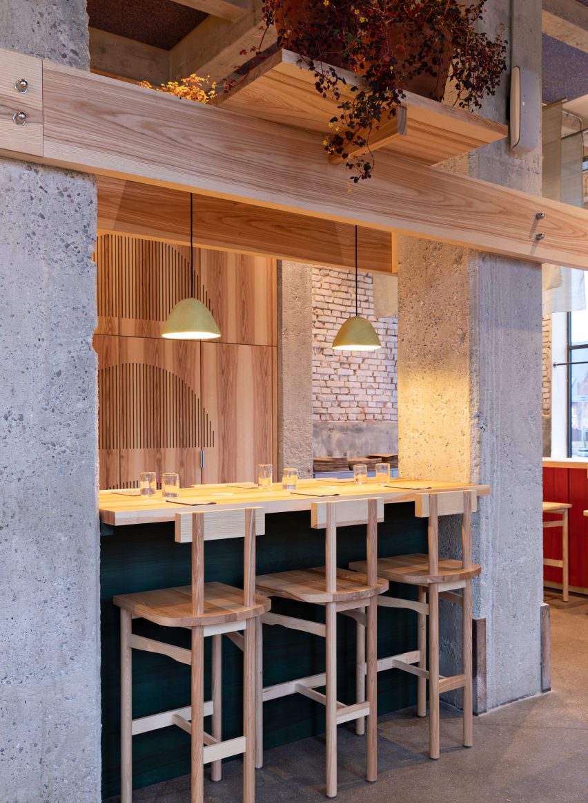 Wooden bar stools in POPL burger restaurant by Spacon & X and e15 for Noma