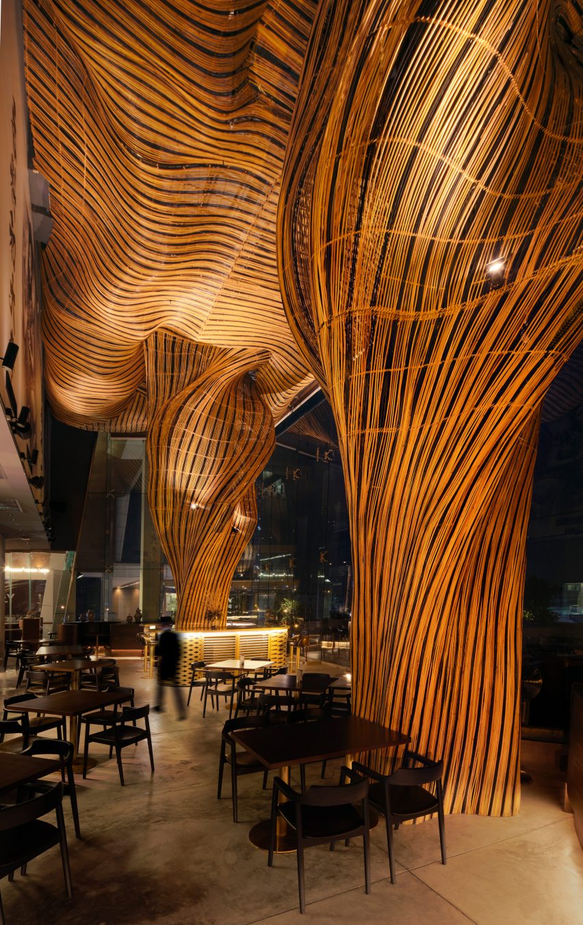 Two rattan pillars at Spice and Barley by Enter Projects Asia