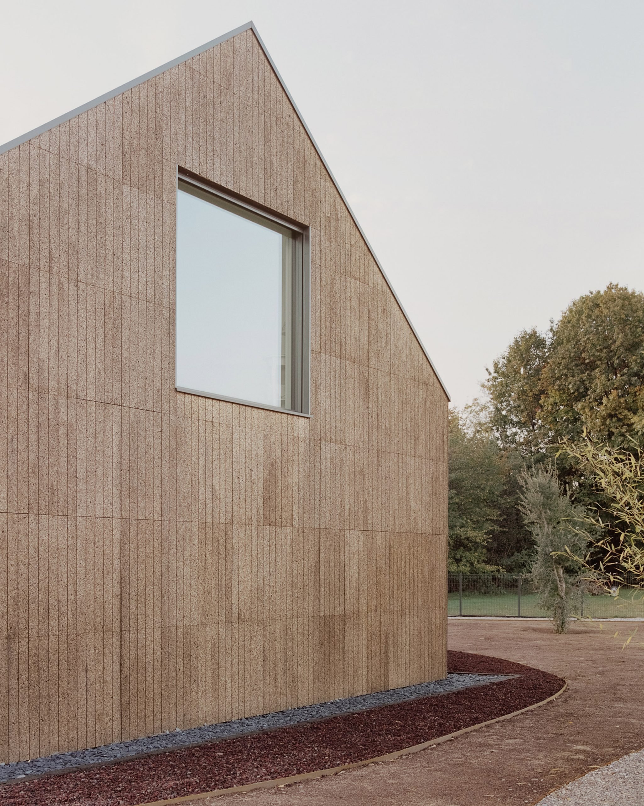 The cork cladding of The House of Wood, Straw and Cork by LCA Architetti
