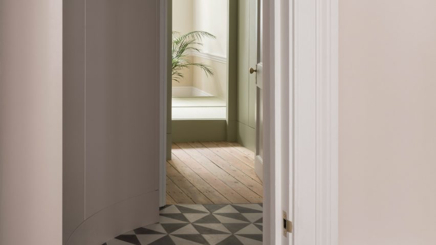 Tiled corridor of Upper Wimpole Street apartment by Jonathan Tuckey Design