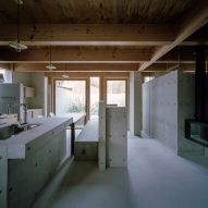 The kitchen of a concrete residence in Japan by FujiwaraMuro Architects