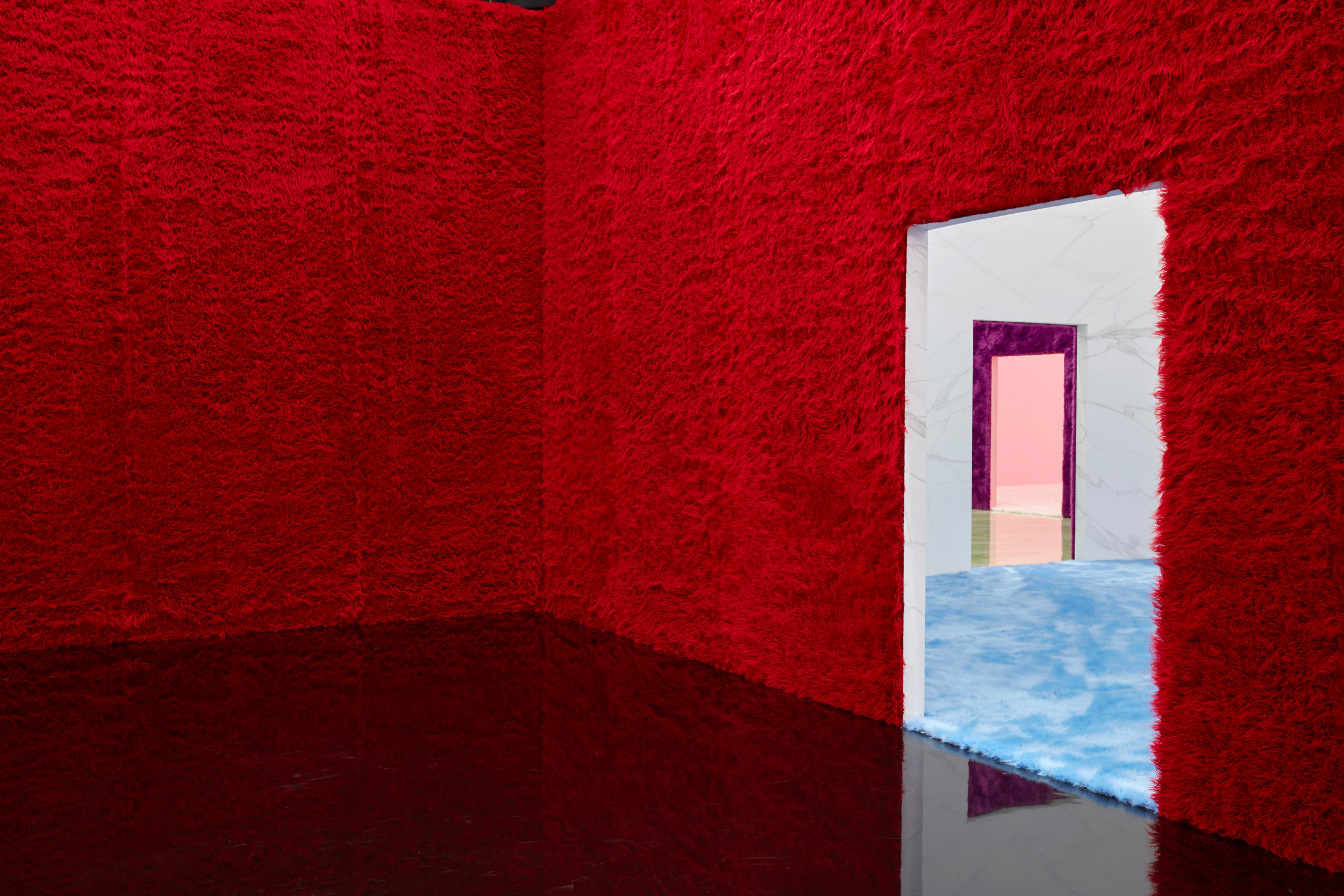 Afvigelse identifikation Gå forud Rem Koolhaas and AMO create faux-fur covered rooms for Prada show