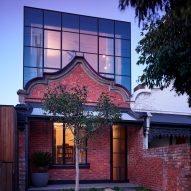 Austin Maynard Architects adds steel-and-glass extension to brick cottage in Melbourne