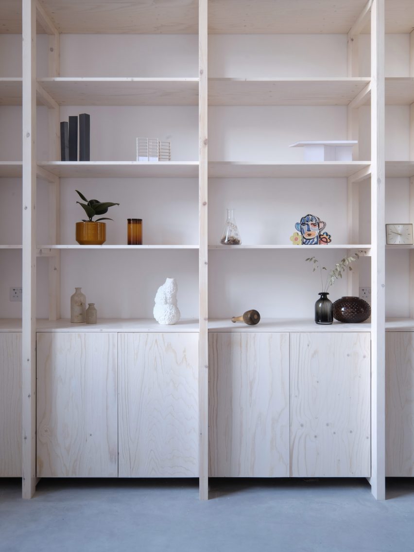 Wooden shelving unit from Bow Quarter Apartment interior by EBBA Architects
