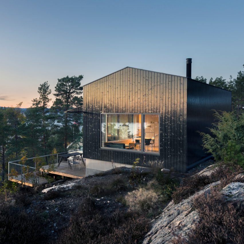 Jon Danielsen Aarhus designs spruce-clad holiday home overlooking the Oslofjord